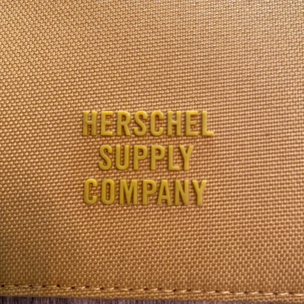 NWOT Herschel Supply Company Yellow Laptop Bag